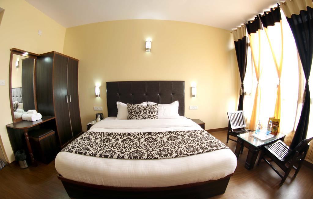 The Grand Welcome Hotel Shimla Bilik gambar